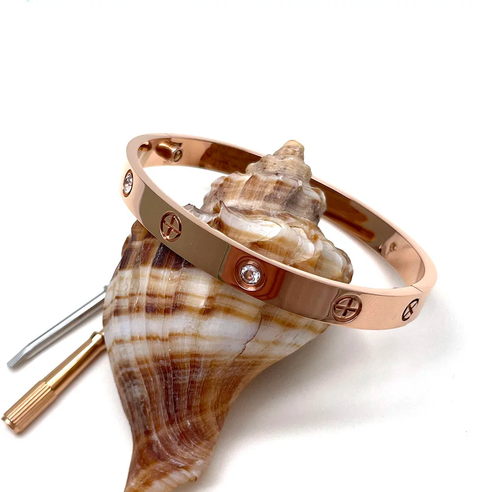 Bracciale a Croce oro rosa con pietre